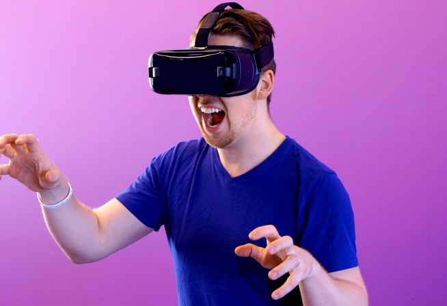 picture of man playing on a vr system